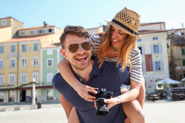 istock Tourist couple having fun together 1165120429