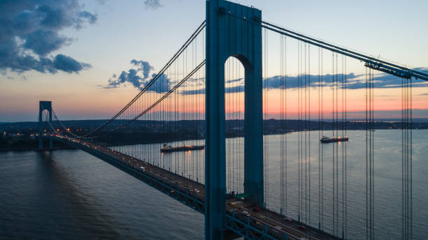 Traffic on Verrazano-Narrows Bridge at sunset. Aerial drone photo stock photo