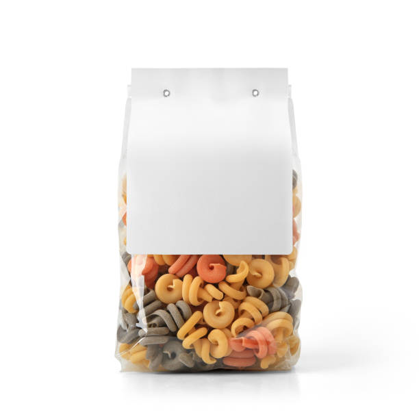istock Transparent plastic colored pasta bag with paper label isolated on white background. 1165124711