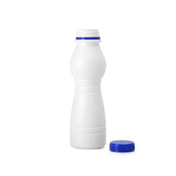 White plastic opened yogurt milk bottle with blue lid isolated on white background.