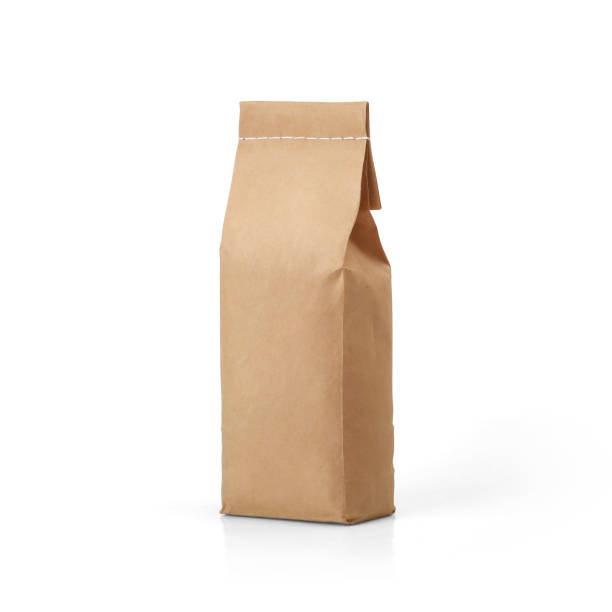 istock Brown craft paper bag with stitch sewing isolated on white background. 1165125351