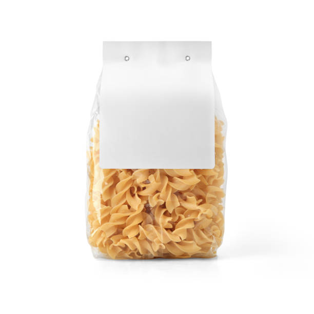 Transparent plastic pasta bag with paper label isolated on white background.