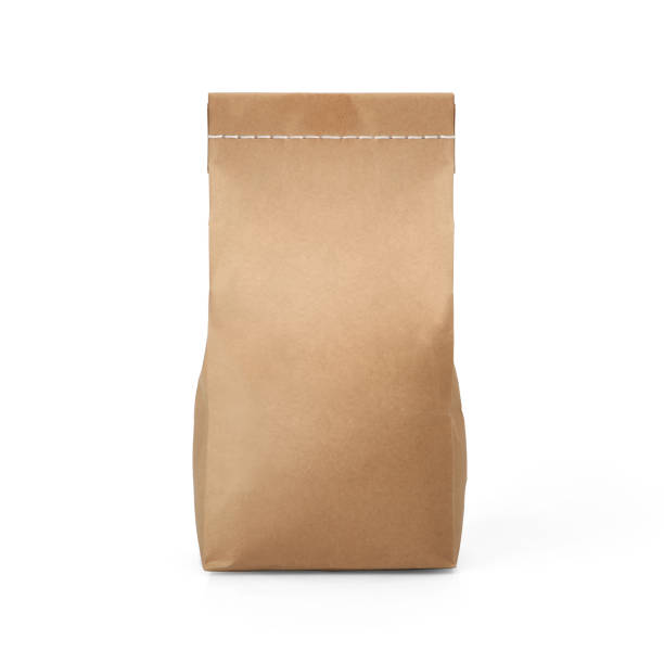 istock Brown craft paper bag with stitch sewing isolated on white background. 1165125679