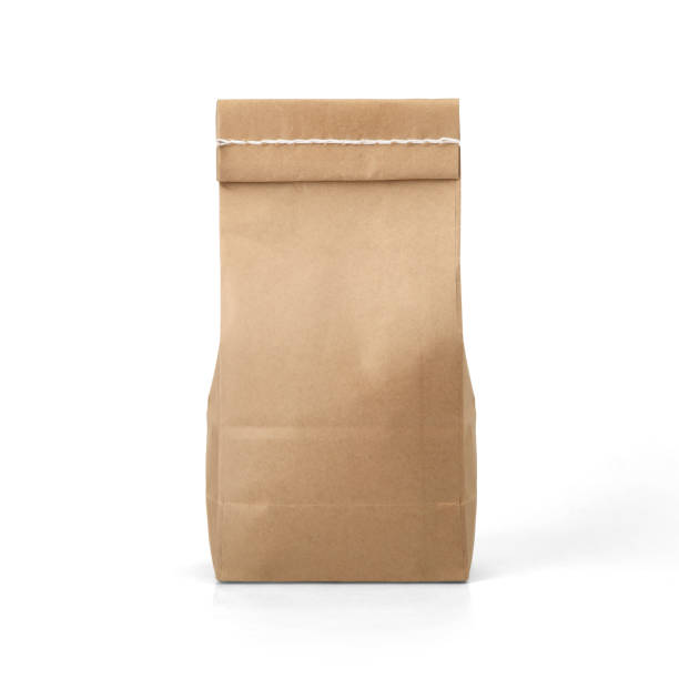 istock Brown craft paper bag with stitch sewing isolated on white background. 1165125749