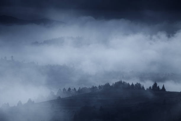 istock Dark hills in fog, Carpathian landscape 1165126065