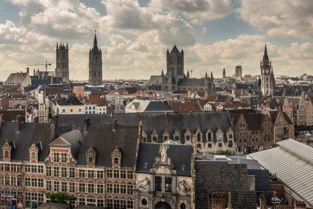 Six towers of Gent, Flanders, Belgium and fish market in front. stock photo
