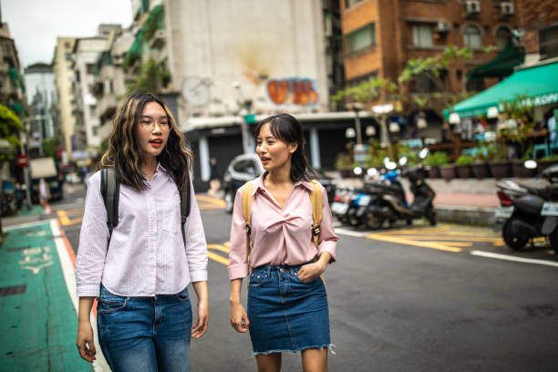 istock Sharing gossips on their way to college 1165129658