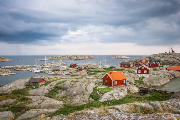 Fishing village in Sweden rough landscape on Väderö Island in the western Skerries of Sweden west coast, Scandinavia fishing village stock pictures, royalty-free photos & images