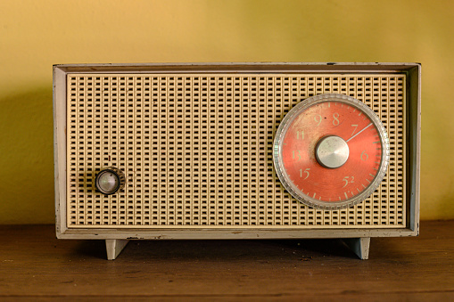 Old portable German red radio from the fifties
