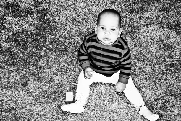 istock Happy chubby toddler. Black and white 1165131984
