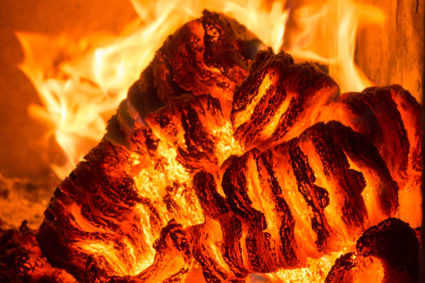 istock Blaze fire flame in stove, orange and black 1165132806