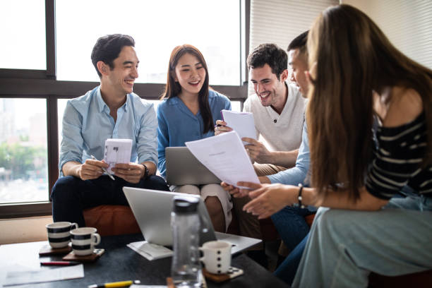 istock Millennial friends working at home in good mood 1165133370