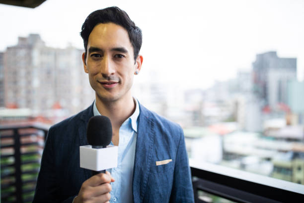 istock Mixed race male TV reporter 1165133587