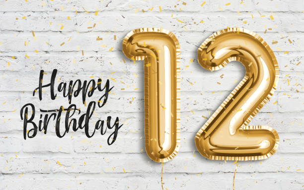 istock Happy 12th birthday gold foil balloon greeting white wall background. 1165137579