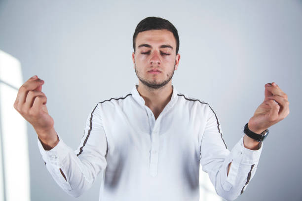 istock man hand meditation in office 1165138919