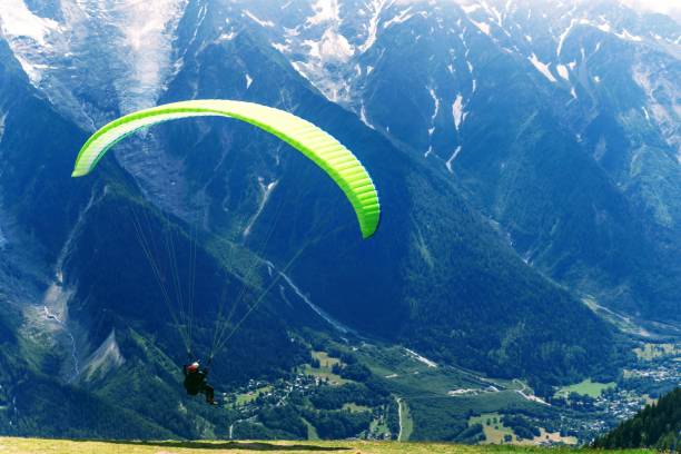 istock Flying on a paraglider. Chamonix France. 1165142282
