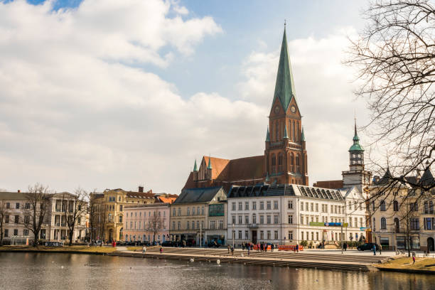 Schwerin, Germany. Views of Schwerin Cathedral (Schweriner Dom) in the Pfaffenteich, a pond lake in the middle of the city