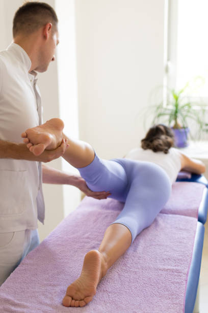 istock Young woman on physical therapy 1165146014