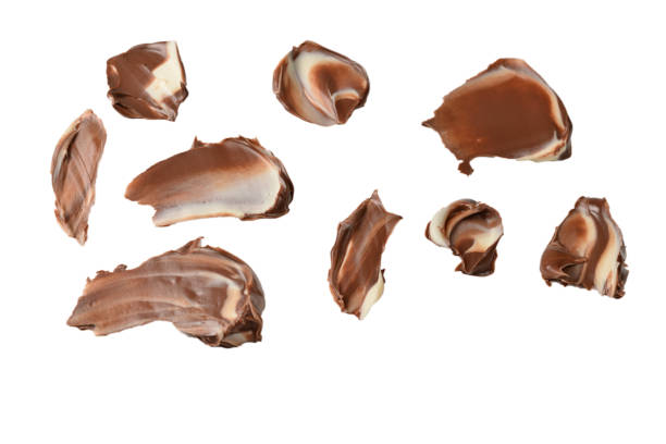 istock Chocolate cream splash isolated on white background. 1165147218