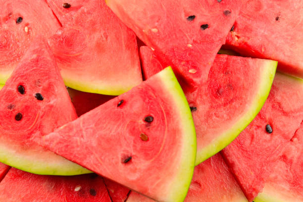 istock Juicy watermelon slices background. Top view. 1165147231
