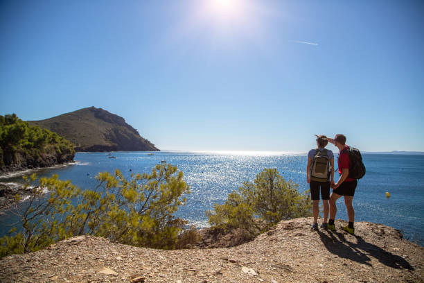 istock Couple hiking along coastal path, Costa Brava, Spain 1165148693