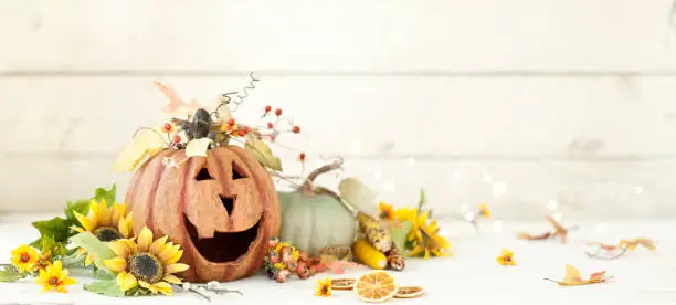 Photo of Pumpkin Jack o Lantern Background on wood