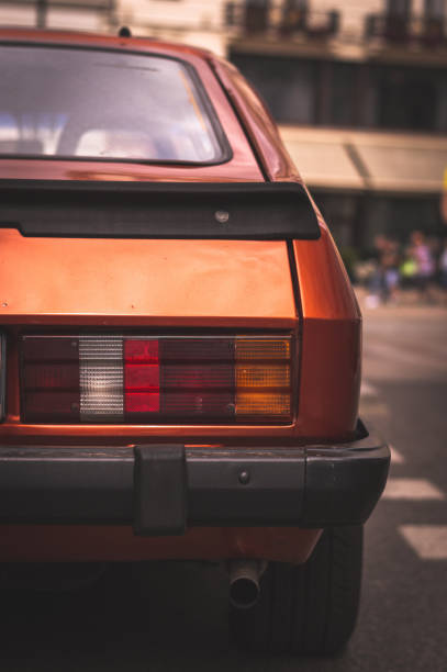 istock Rear light of a Orange vintage car 1165159948