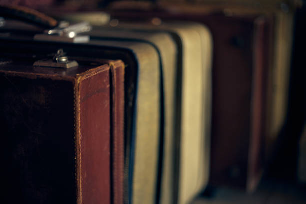 istock Blurred vintage suitcases. Close.up 1165160033