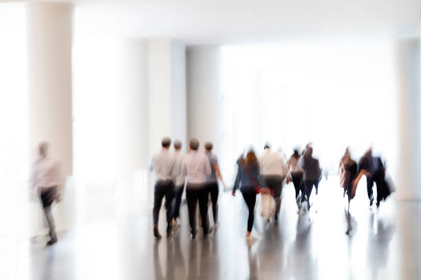 istock Motion Blurred Group of Business People 1165161483