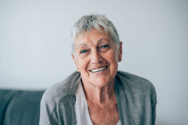 istock Confident and happy senior woman 1165167628