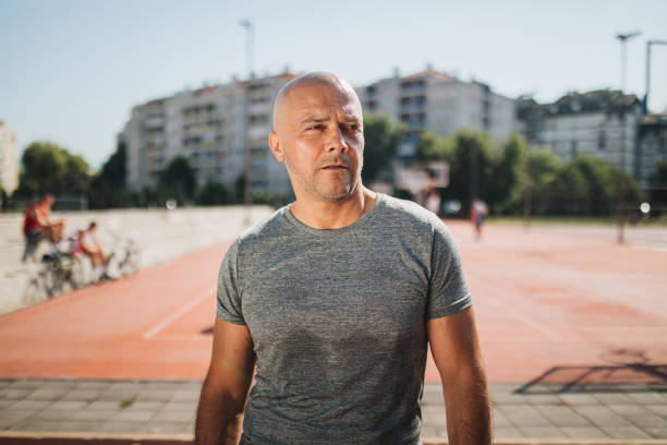 istock Senior bald man striving to be more healthy 1165168347