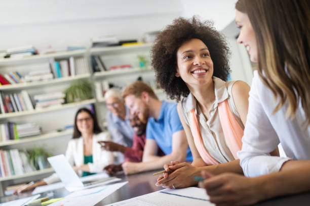 istock Successful group of business people at work in office 1165170605