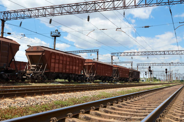 istock Industrial railway - wagons, rails and infrastructure, electric power supply, Cargo transportation and shipping concept. 1165173866