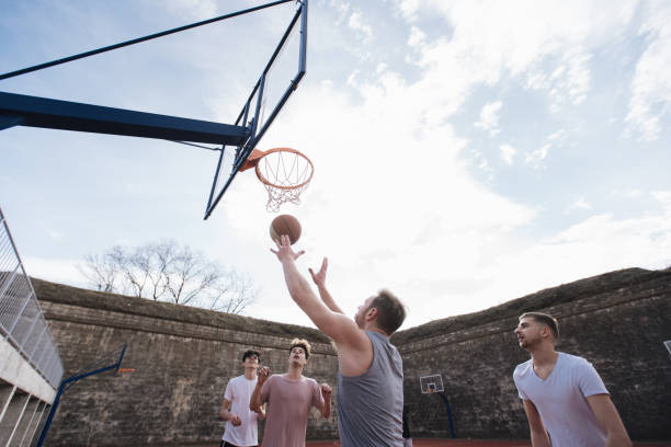 istock Amateur basketball match between friends 1165177493