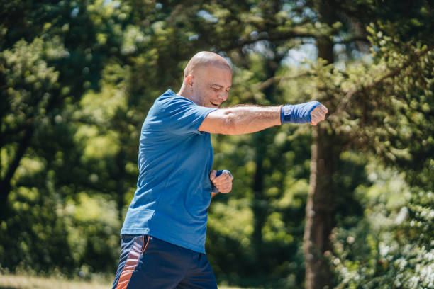 istock Mature sportsman working on his uppercut 1165177694