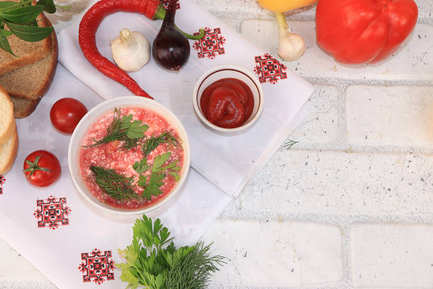 istock Traditional Russian borsch with egg and bread on a wooden table, place for text and menu, copy space. 1165180342