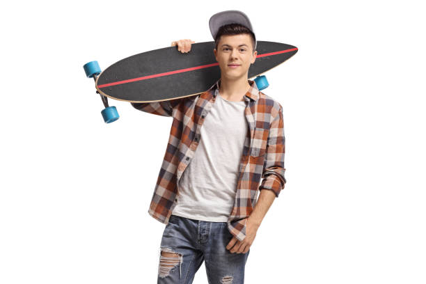 istock Teenager with a longboard 1165181533