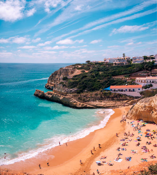 Blue turquoise beach in a sunny day in Portugal