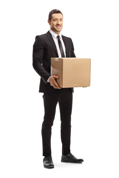 hombre en traje sosteniendo una caja de cartón - box men holding isolated fotografías e imágenes de stock
