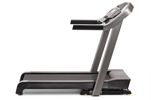 Studio shot of a professional treadmill Studio shot of a professional treadmill isolated on white background treadmill stock pictures, royalty-free photos & images