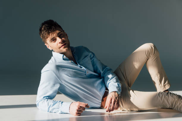 istock pensive handsome man resting in sunlight 1165185860