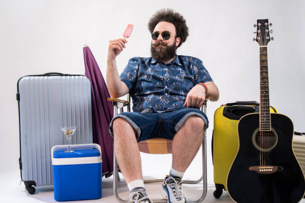 これが私の夏の様子 - travel suitcase hawaiian shirt people traveling ストックフォトと画像