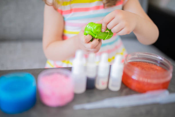 istock Child making slime closeup photo 1165187167