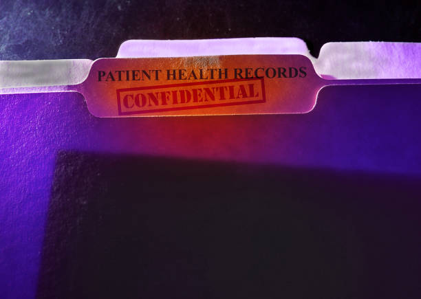 Confidential patient health records folder stock photo