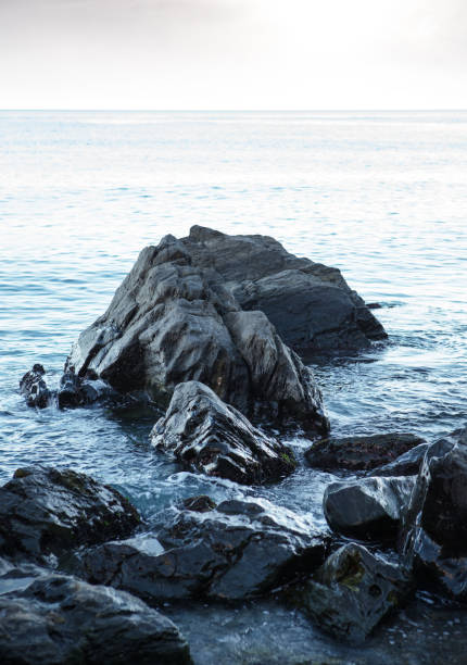 istock large rocks going out to sea 1165191863