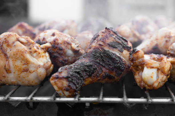 istock Chicken skewers on a metal grid 1165192431