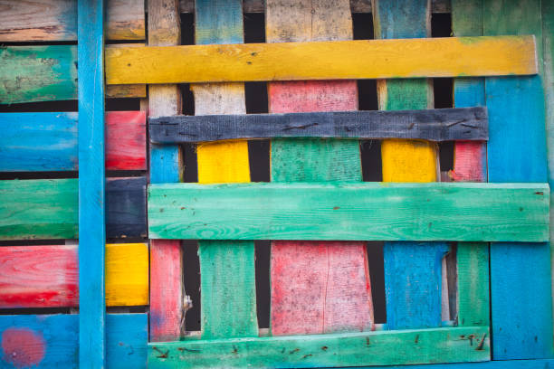 istock Background of multi-colored wooden boards.  Wooden texture 1165192496