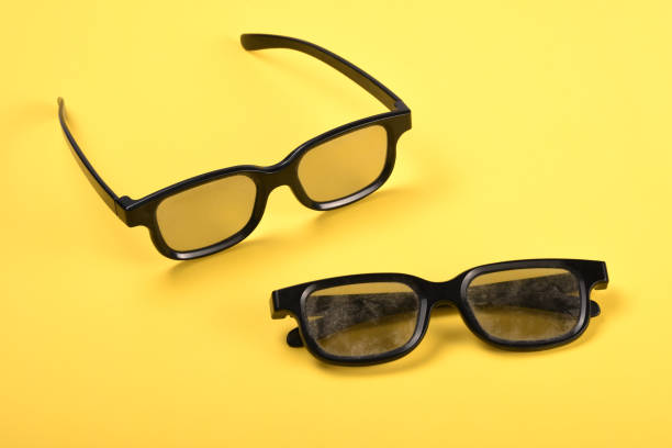 istock Dusty eyeglasses on yellow background 1165195027