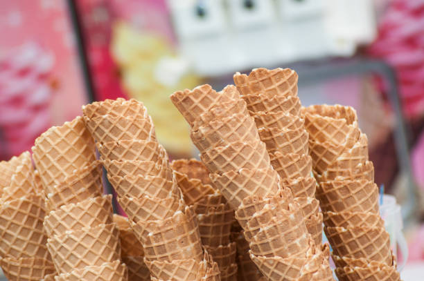 istock ice cream cones pile in the funfair 1165196507