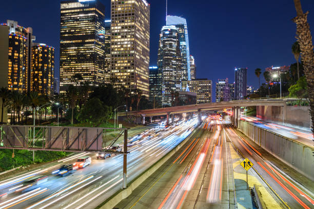 istock Downtown Los Angeles at sunset with car traffic light trails 1165203707